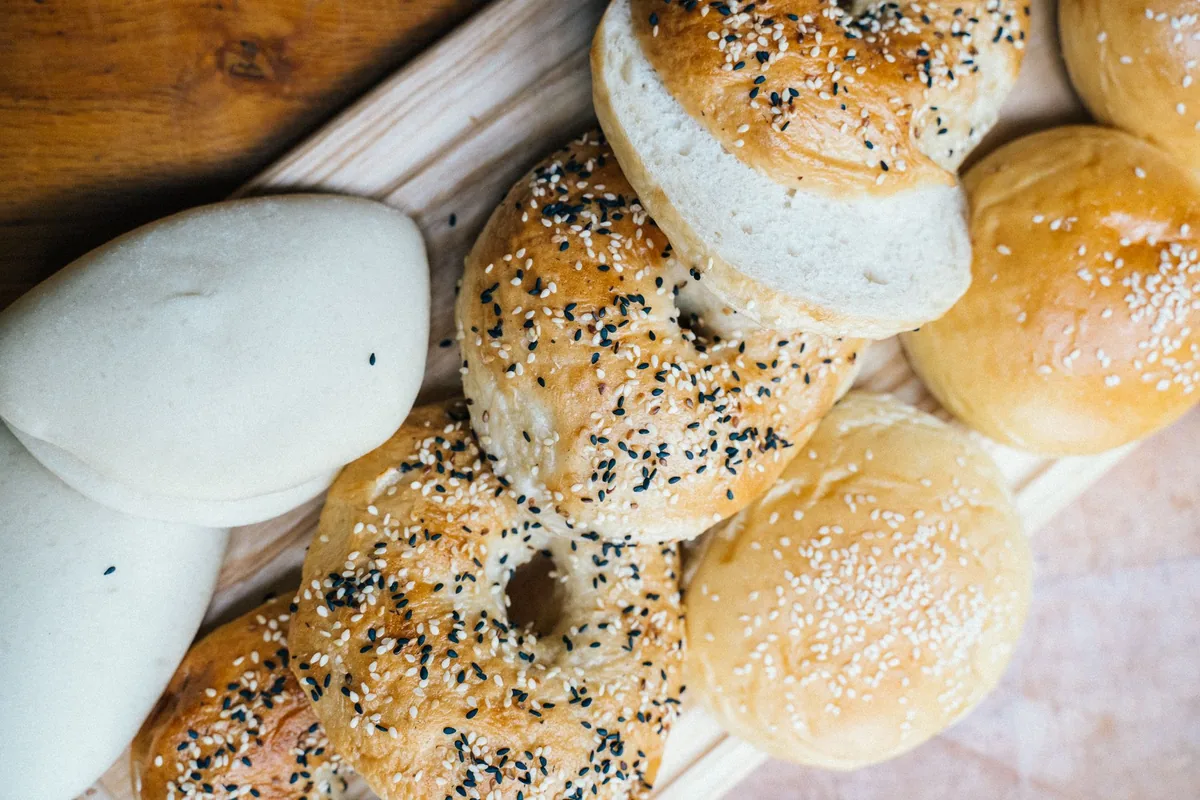 A bagel halved and toasted