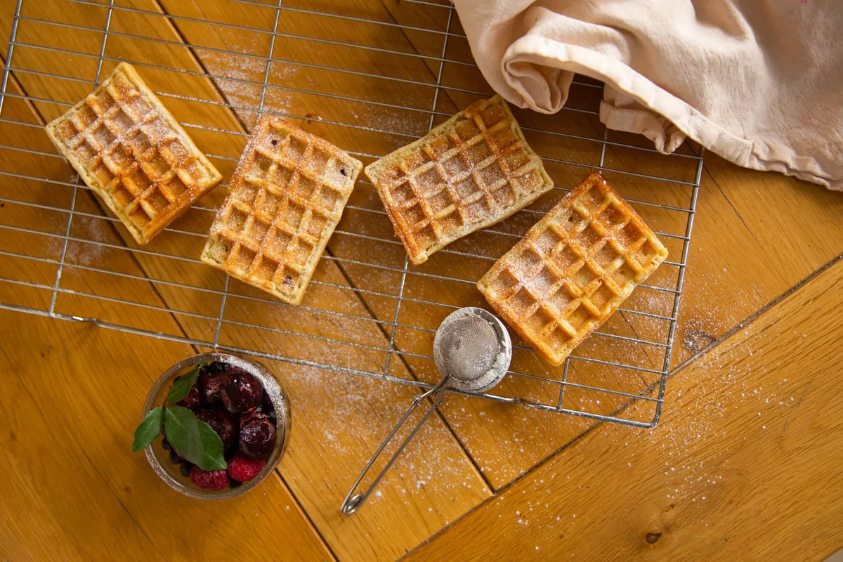 A Belgian waffle with berries