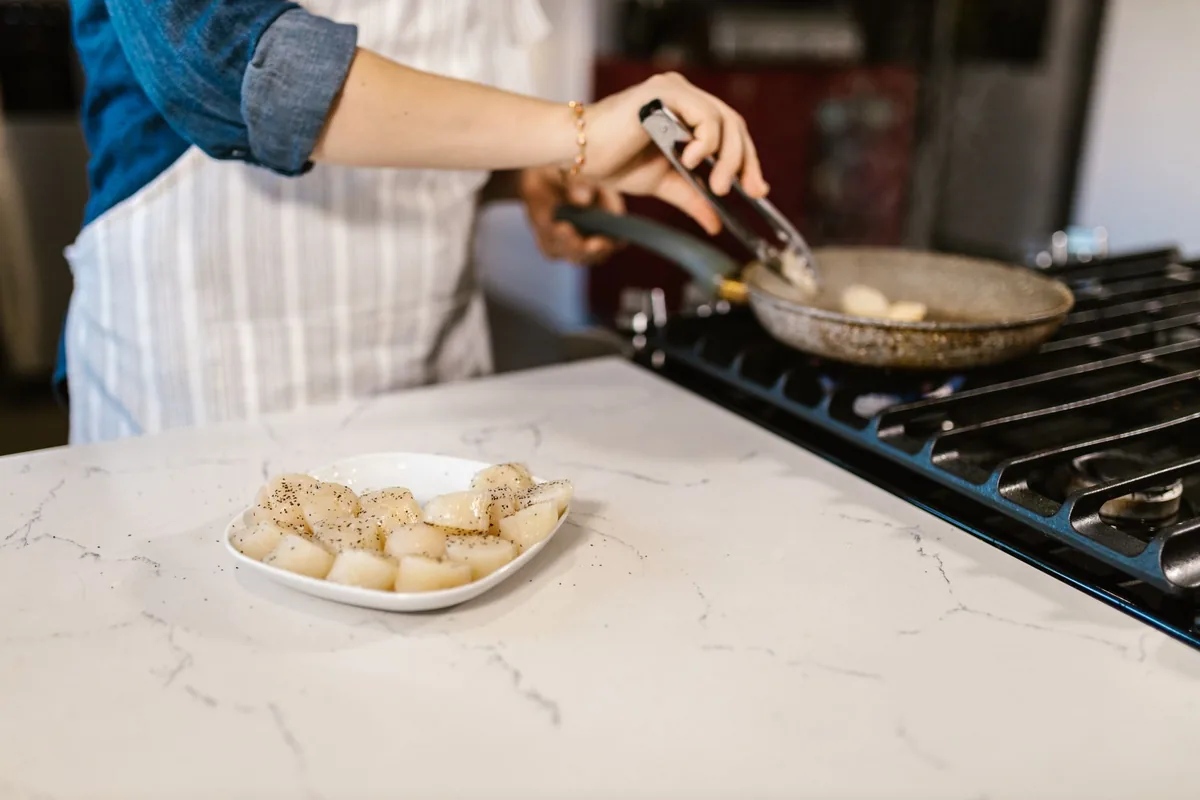 A busy kitchen worktop