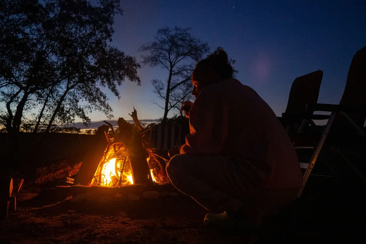 A camp fire after dusk