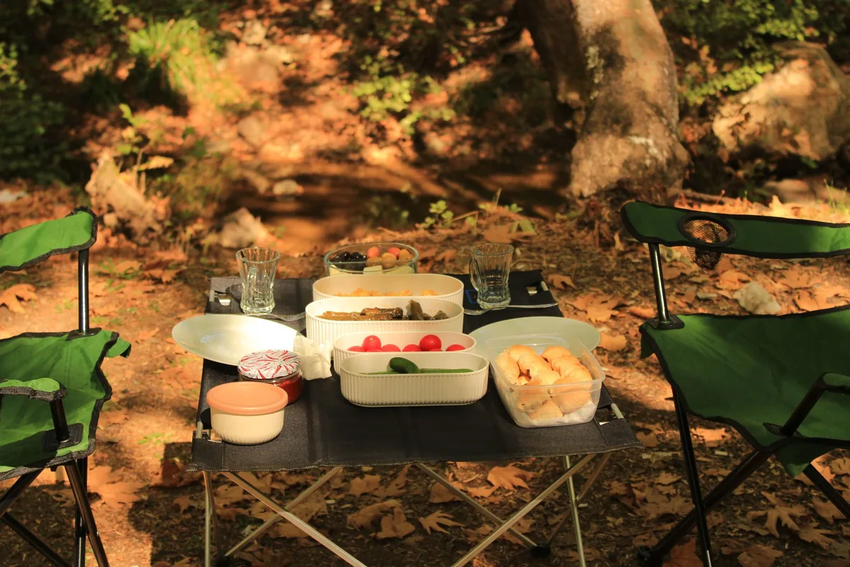 A camping table with food