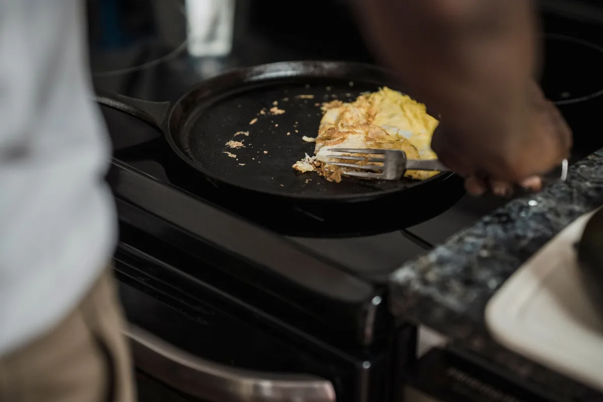 A cast iron skillet on a hob