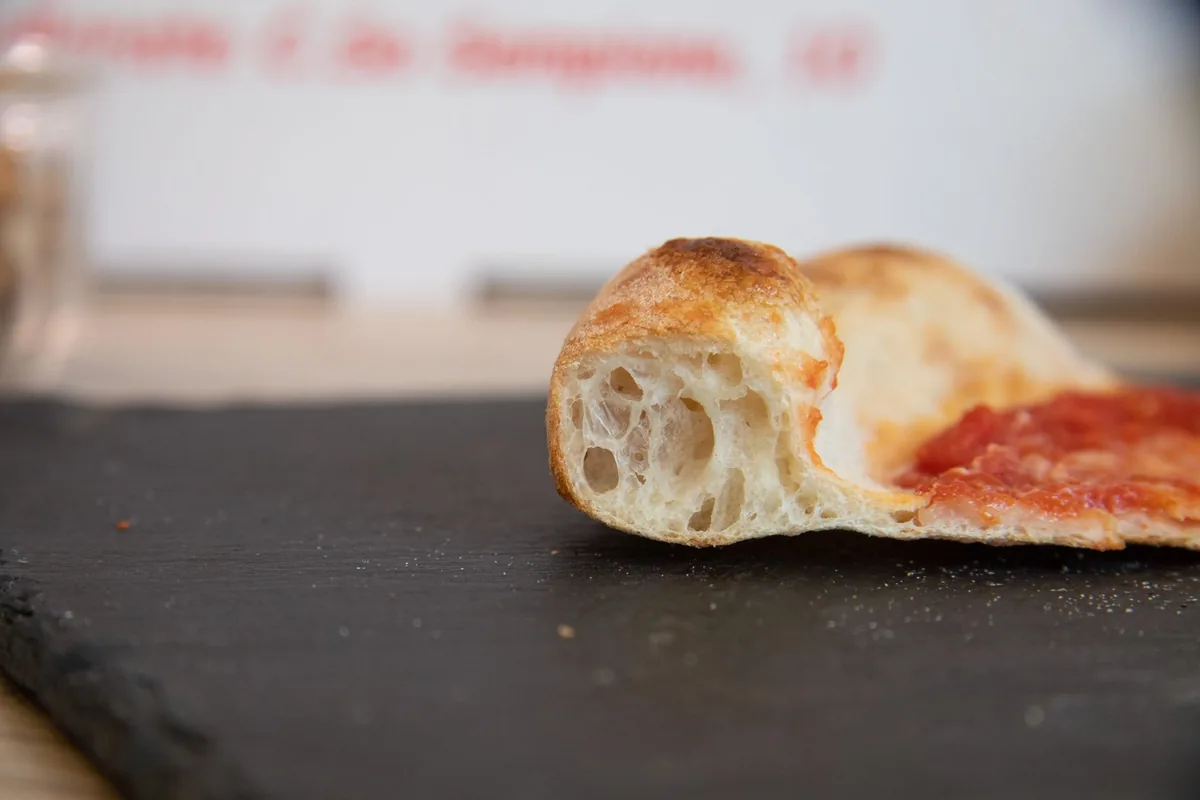 A crisp pizza base underneath