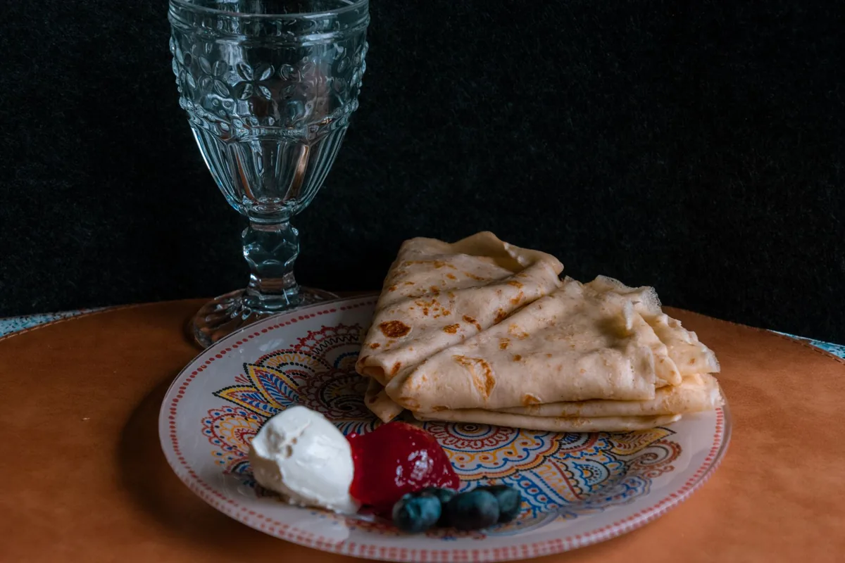 A folded crepe with berries