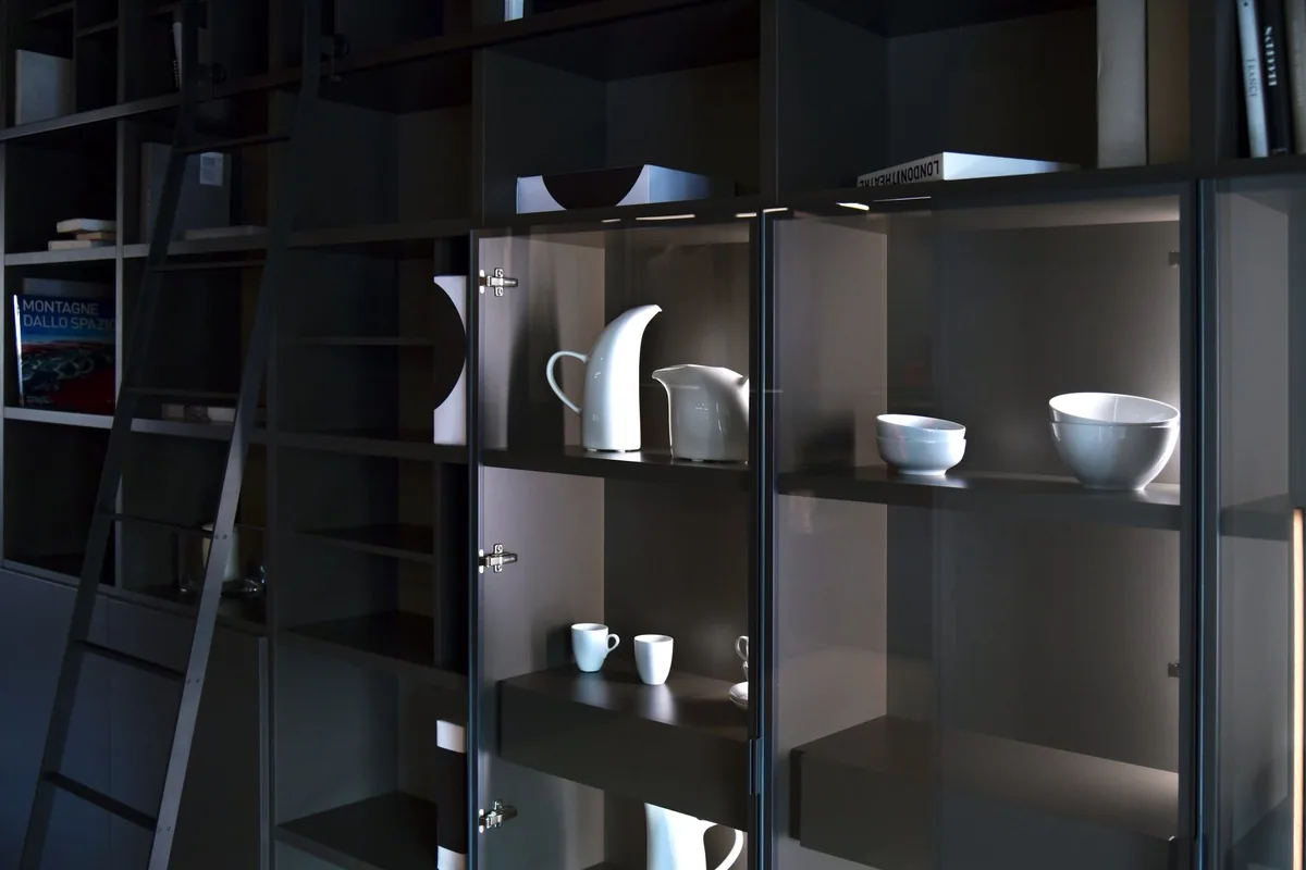 A lit glass door cabinet