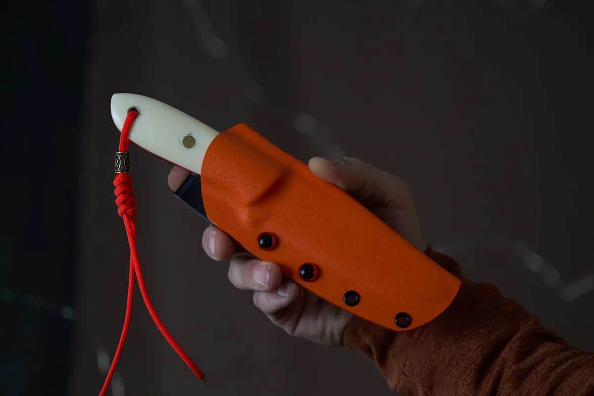 A leather sheath and belt