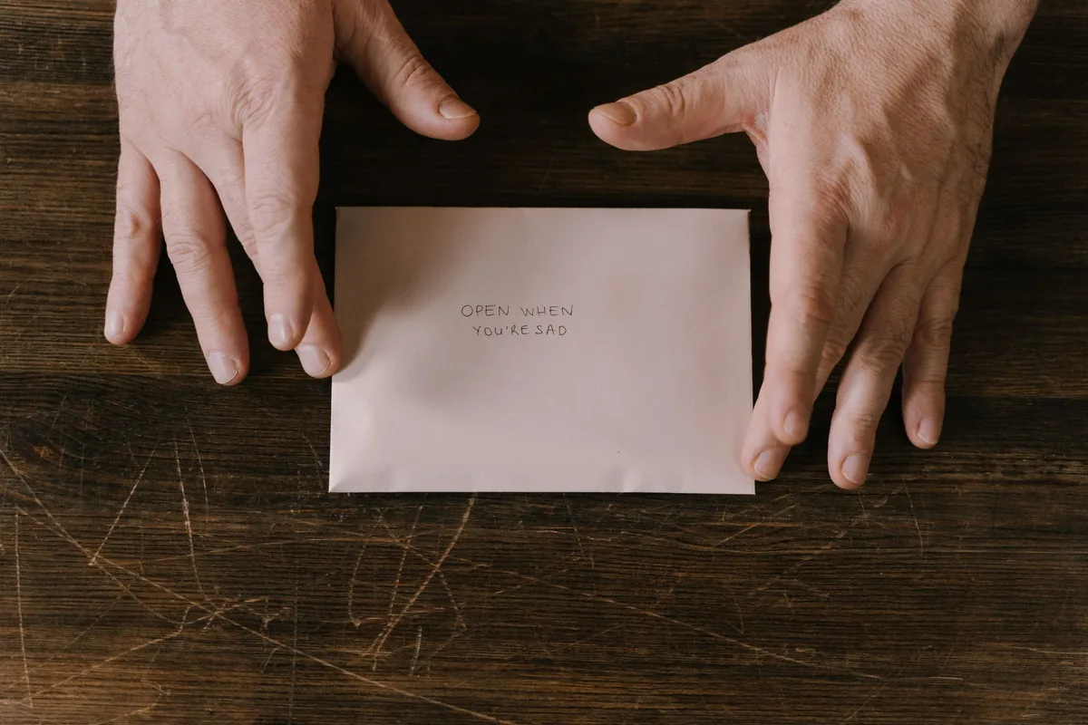 A parcel being opened with scissors