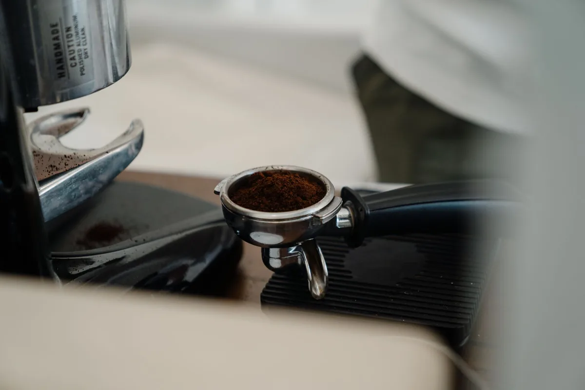 A portafilter locked into a machine