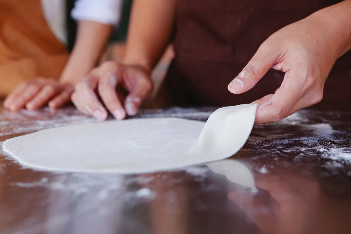 A raw dough base shaped