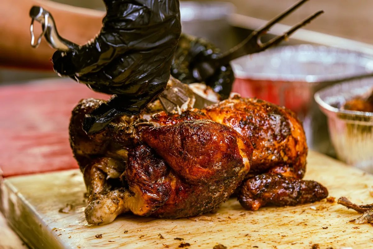 A roast resting on a board