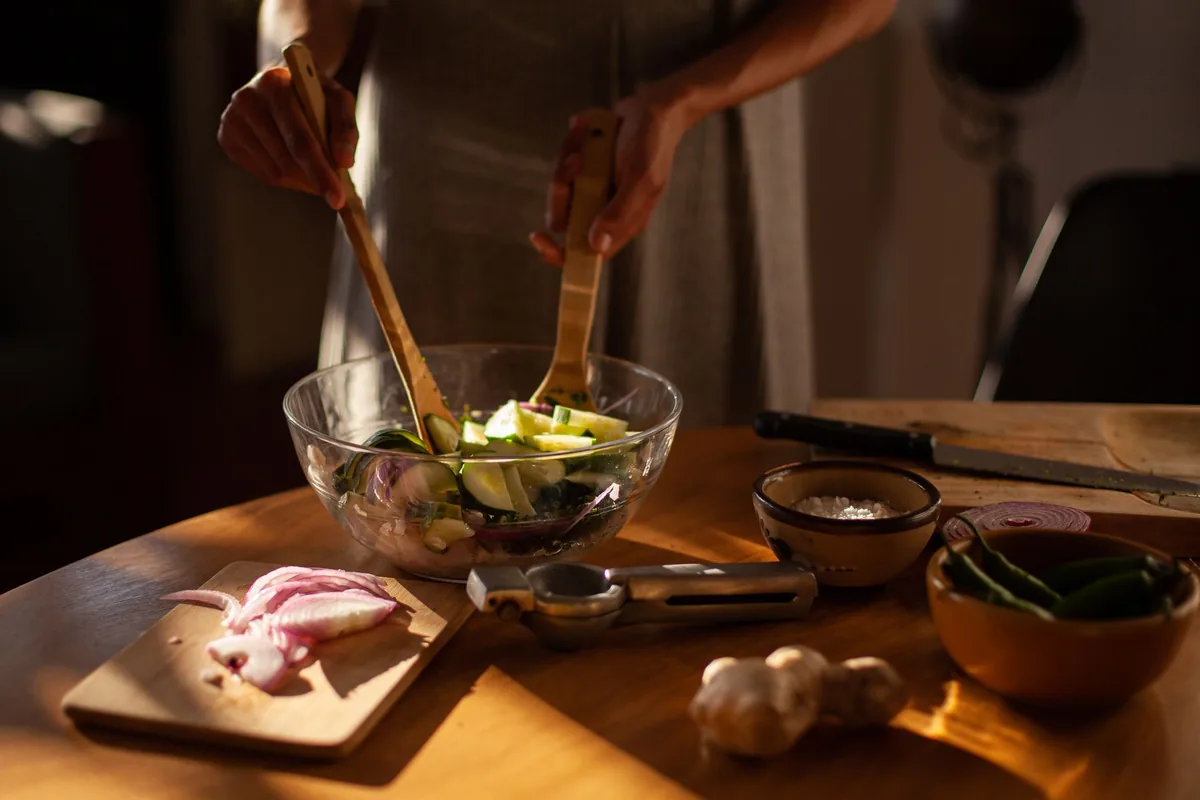 A salad tossed in a large bowl