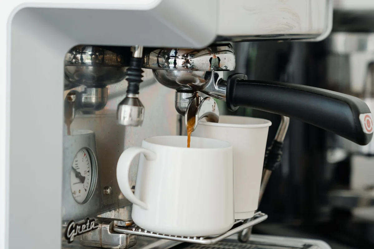 A single mug under a brewer