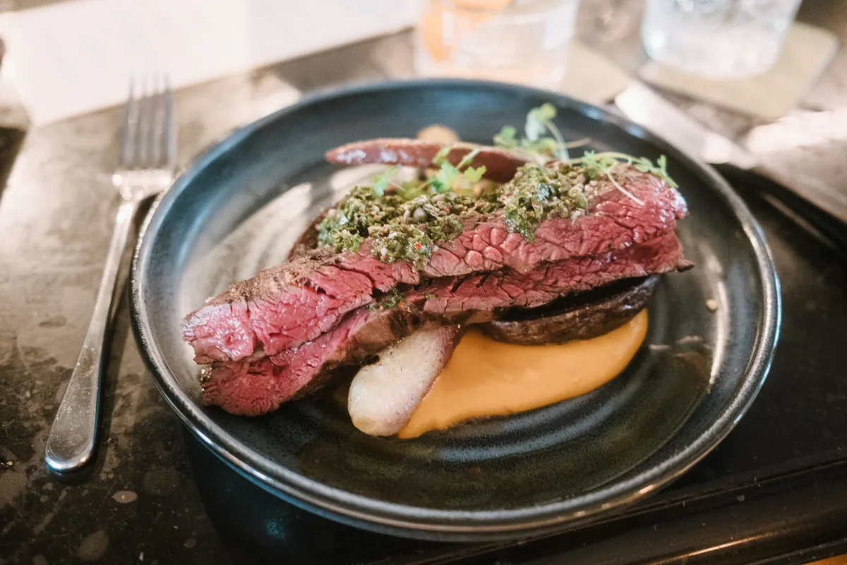 A steak sliced on a plate