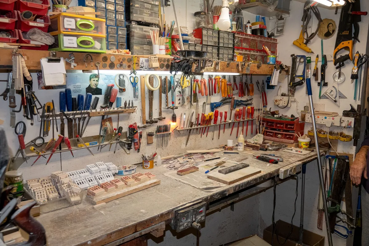 A workbench with small tools