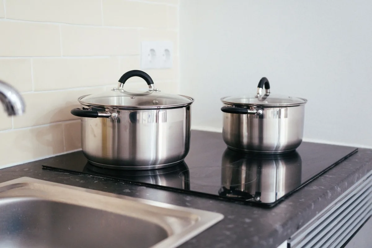 An induction hob with a pot