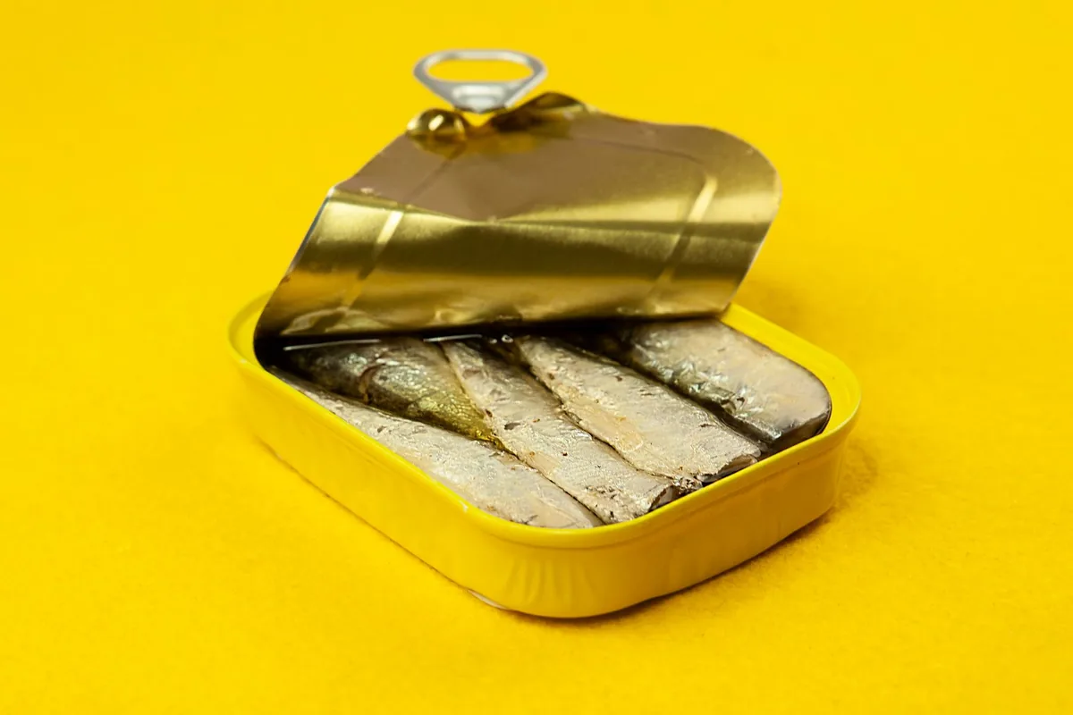 An open tin can of food