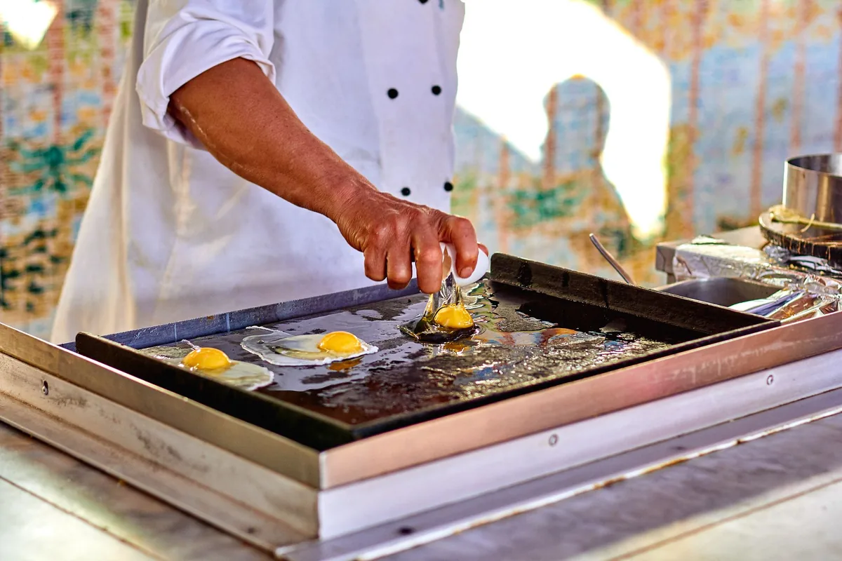 Bacon and eggs on a flat top