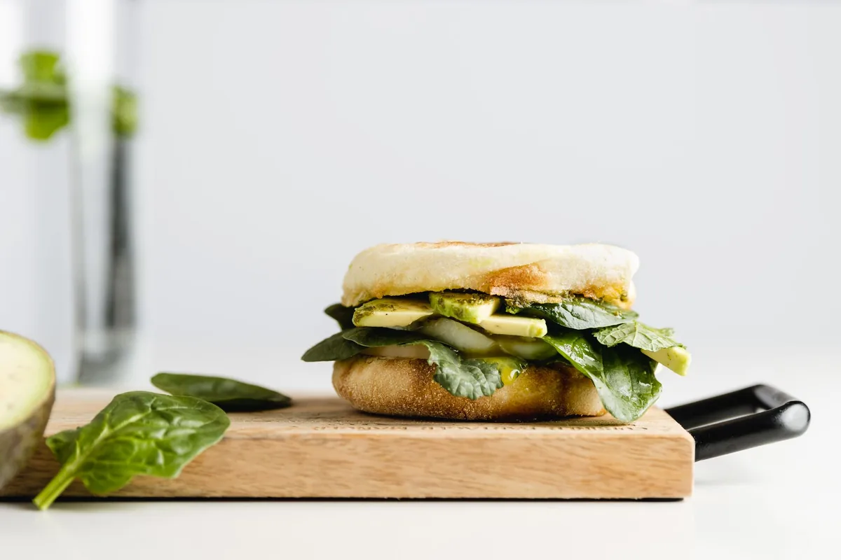 Breakfast sandwich with spinach and avocado