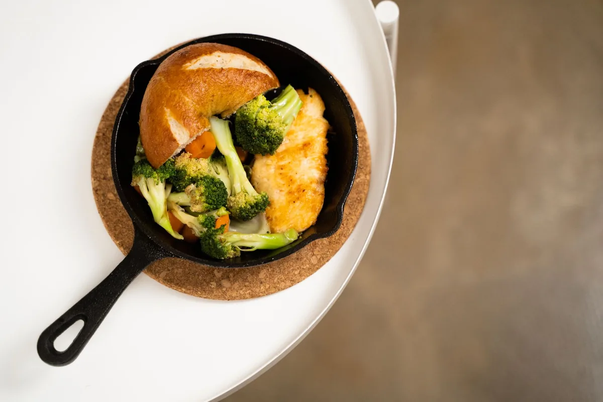 A chicken skillet with broccoli and carrots