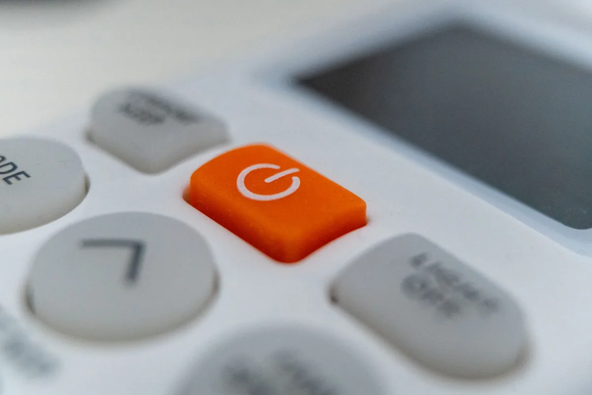 Close-up of control buttons on a kitchen appliance