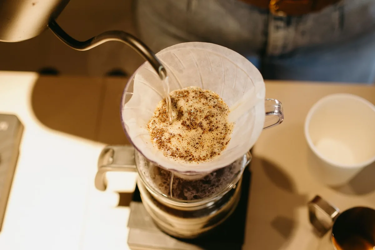 Coffee grounds steeping in water