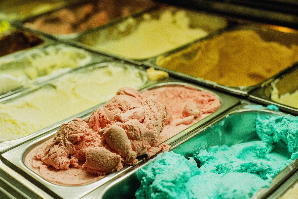 Various ice cream flavours in a shop freezer