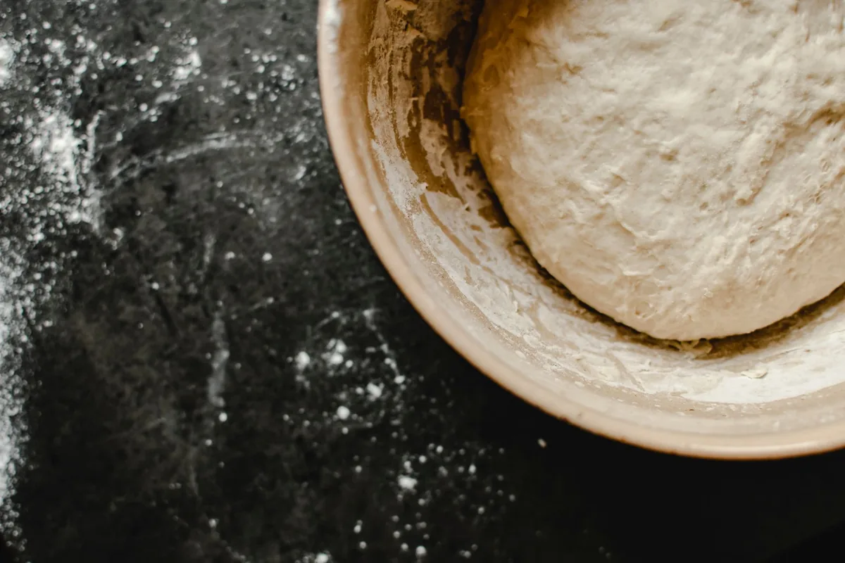 Dough rising in a bowl