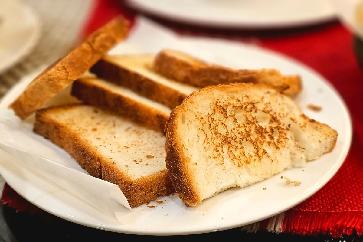 Close-up of toasted bread slices on a plate