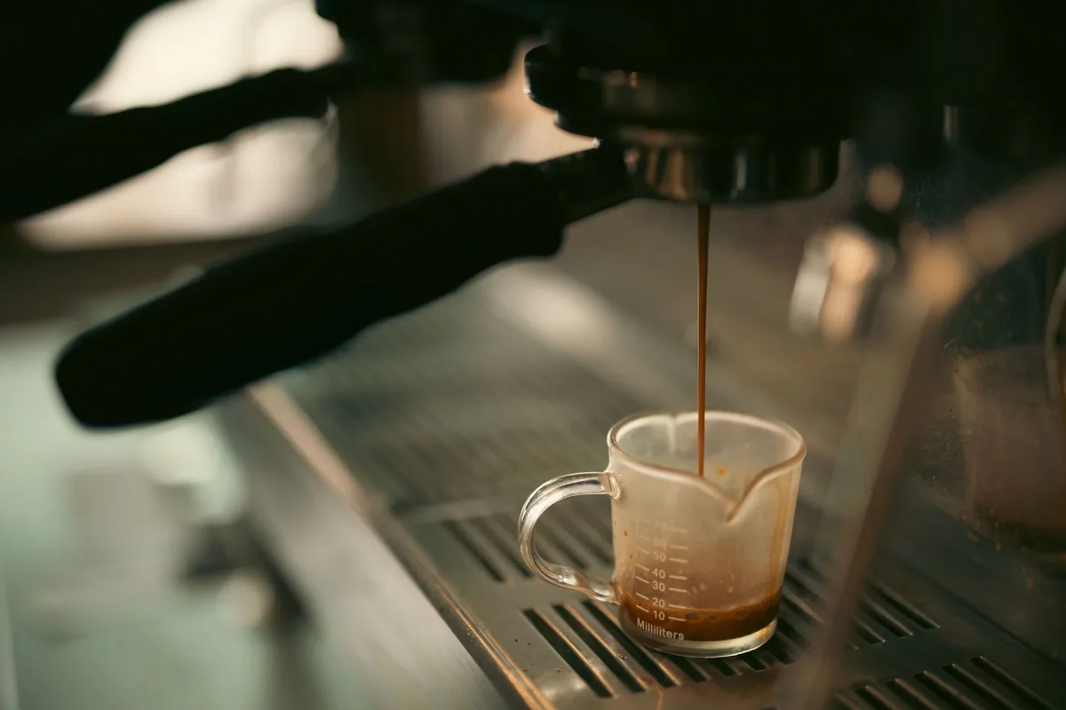 Espresso pouring into a cup