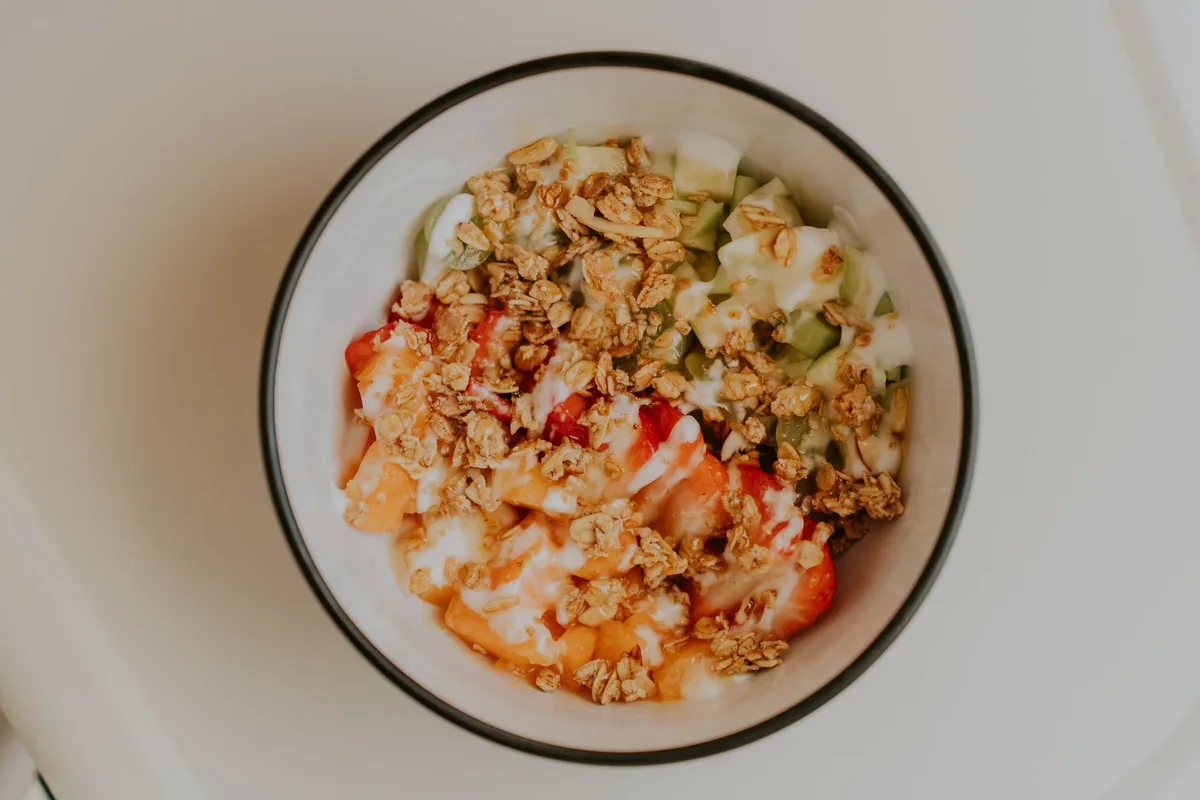 Granola and fruit bowl with yogurt