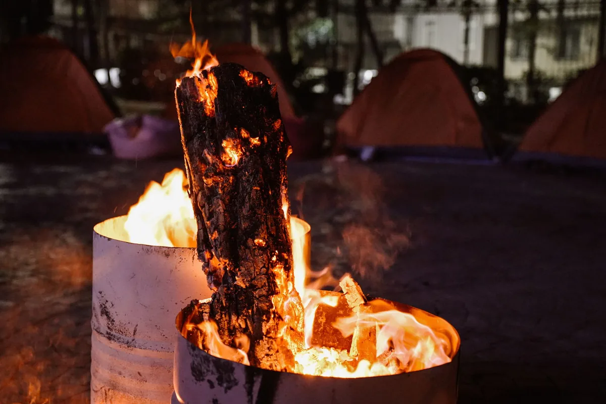 Gear drying by a fire