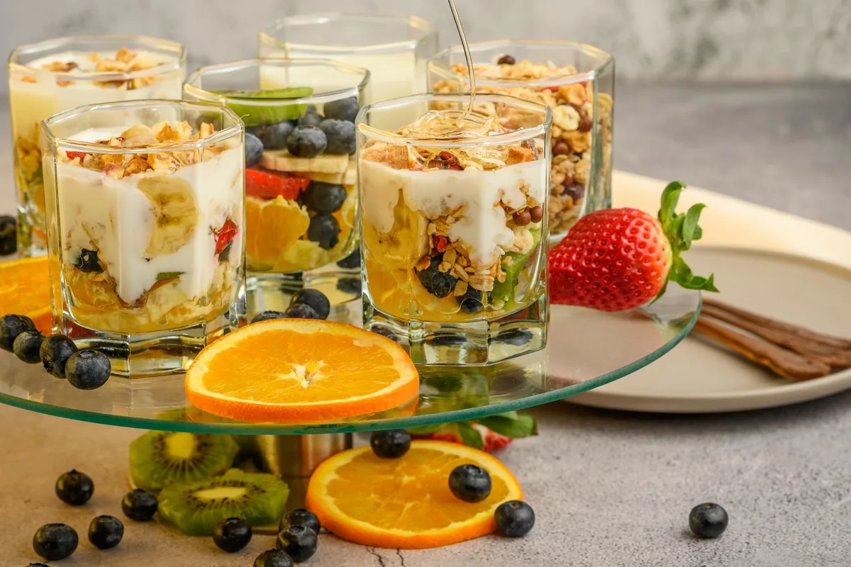 Granola and yogurt layered in a glass
