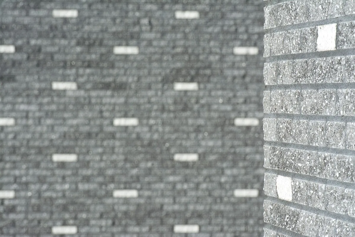 A grey abrasive block