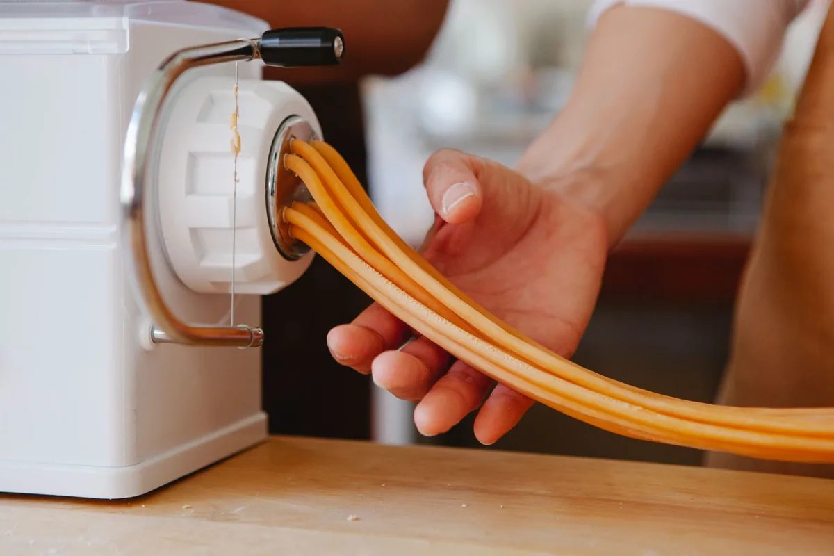 Hands holding a kitchen tool