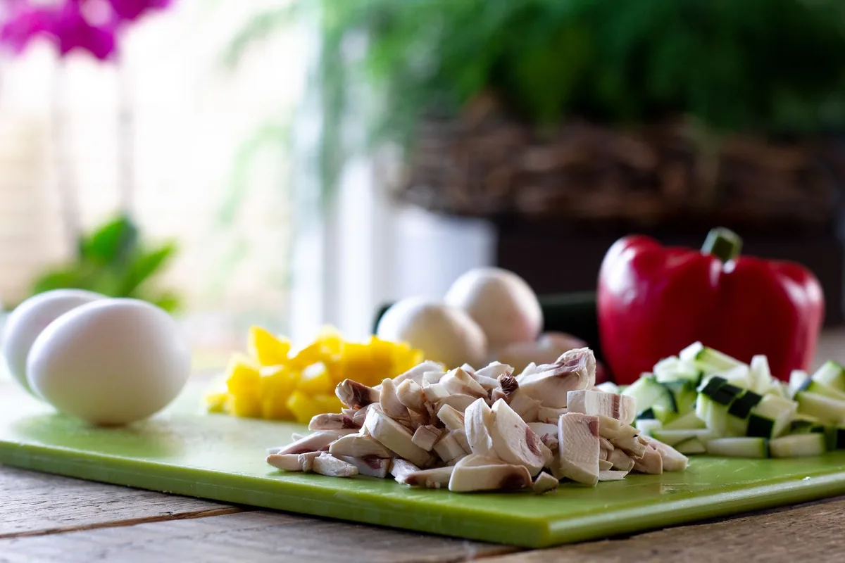 Fresh ingredients including mushrooms and vegetables ready for prep