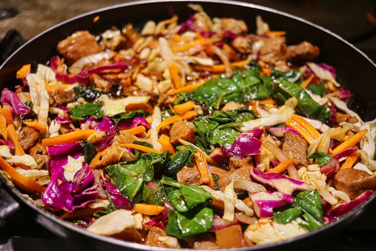 Stir-fry of beef and mixed vegetables in a pan
