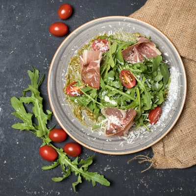 Antipasto salad with cured meats, arugula, and parmesan