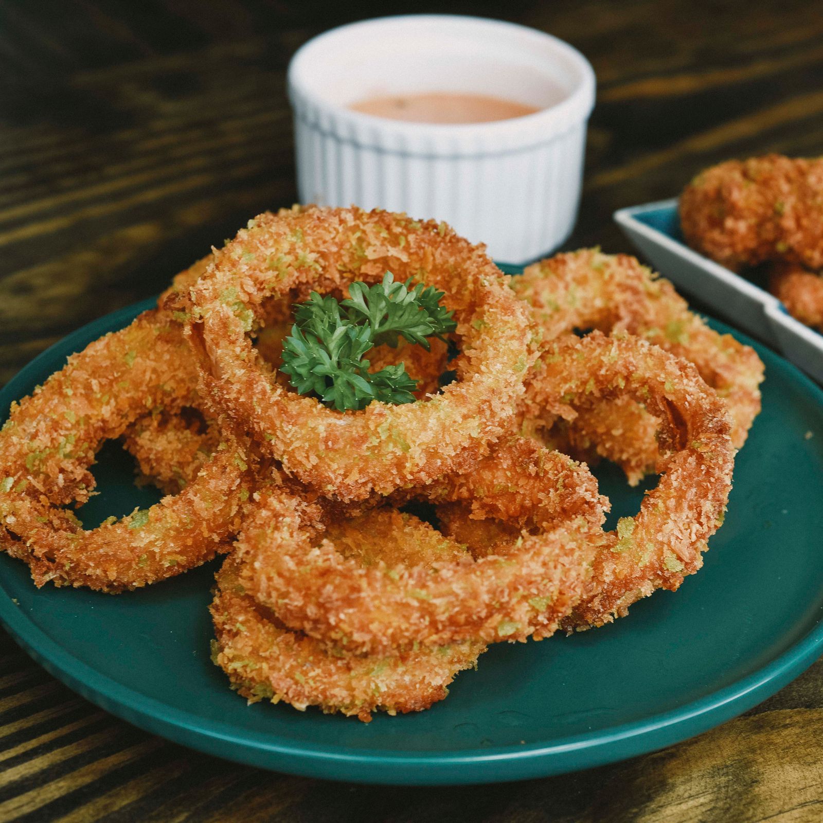 Crispy onion rings on a plate