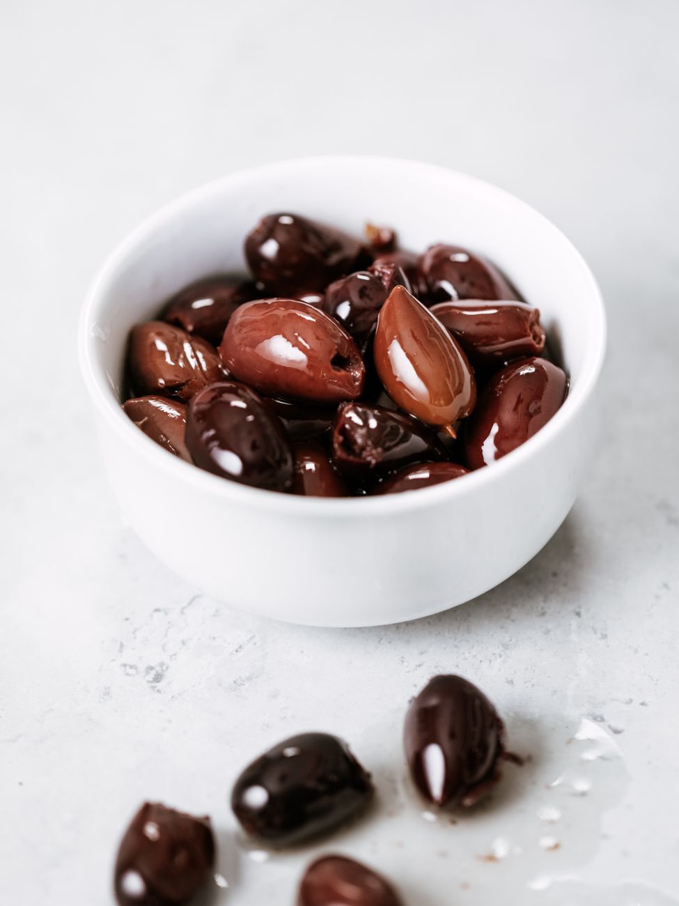 Bowl of black olives with garlic