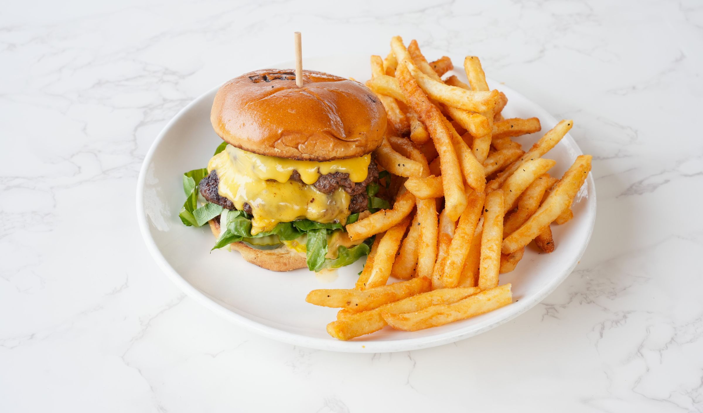 Cheeseburger served with french fries