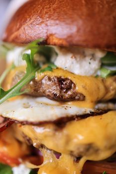 Close-up of a cheeseburger with melted cheese