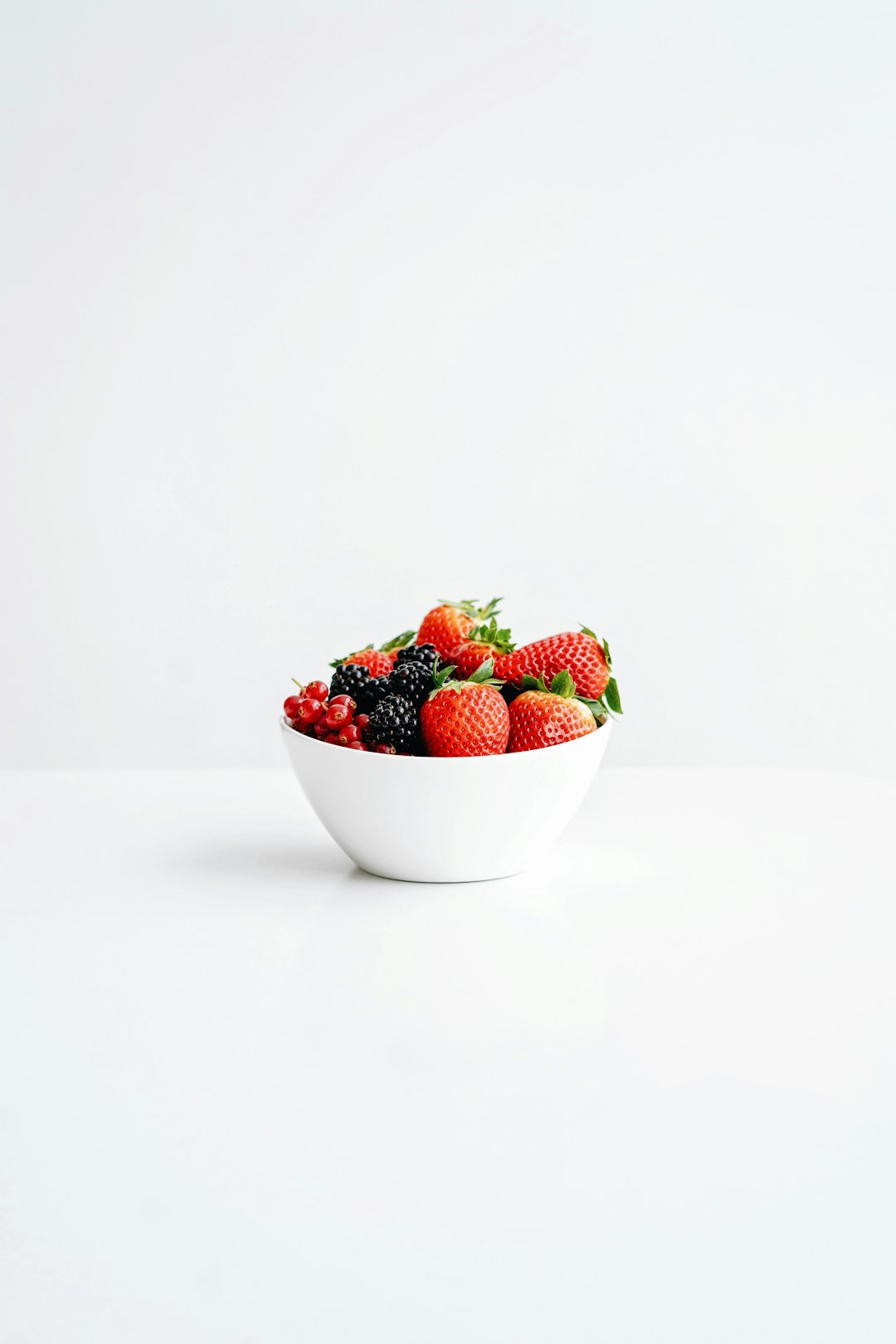 Bowl of fresh strawberries and berries