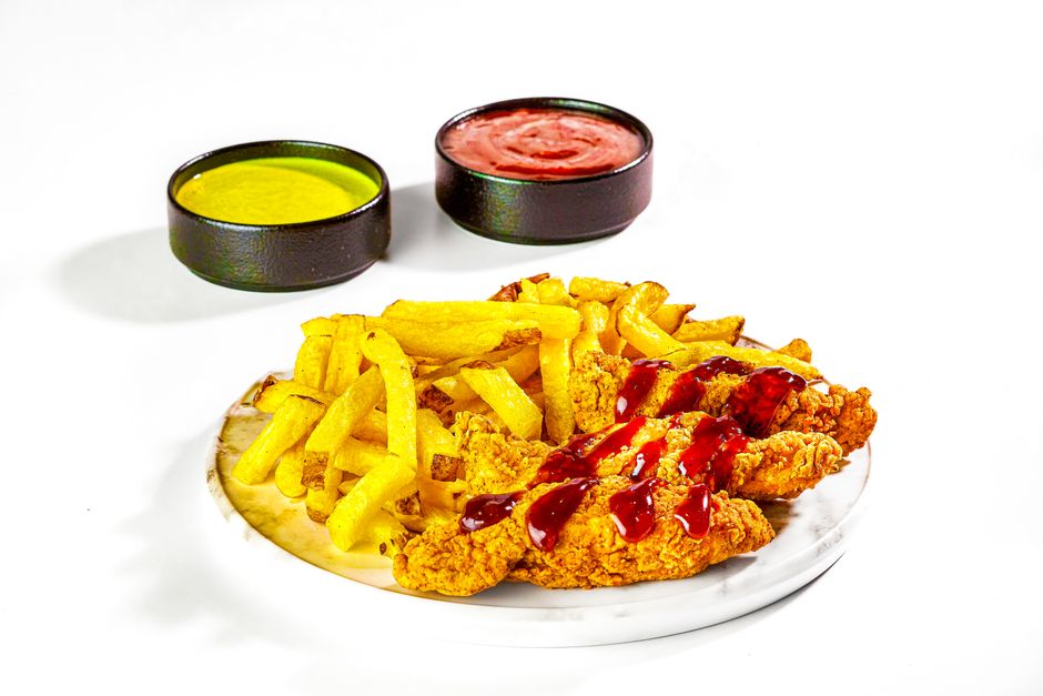 4 pcs. Chicken Tenders, French Fries, Free Can Soda