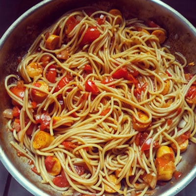 Linguini pasta with marinara sauce and cherry tomatoes