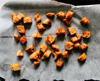 Crunchy croutons on parchment paper