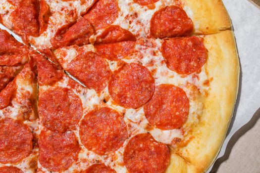 Curled pepperoni close-up