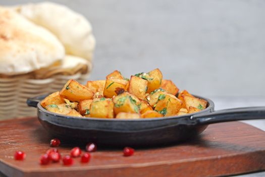 Diced home fries in a skillet
