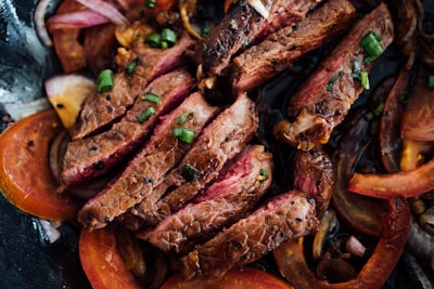 Grilled steak strips with onions
