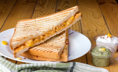 Grilled sandwich with melted cheese, sliced open