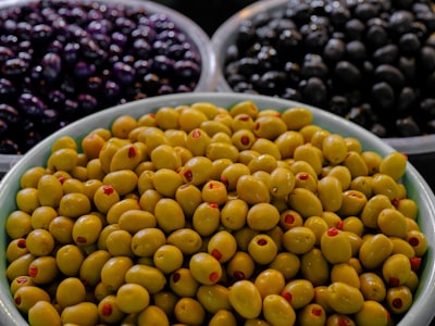 Bowls of green and black olives